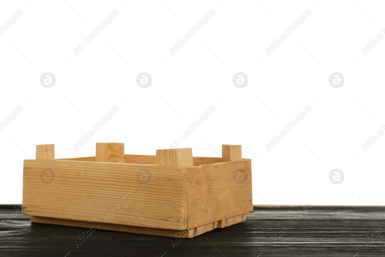 Photo of Empty rustic wooden crate on table against white background. Space for text