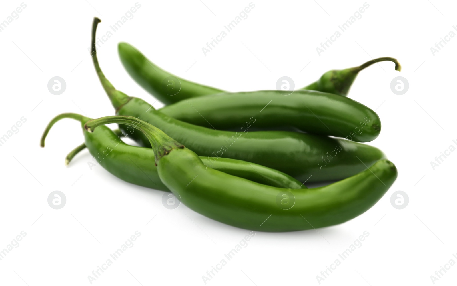 Photo of Green hot chili peppers on white background, closeup