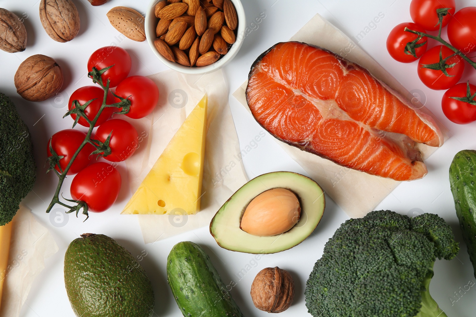 Photo of Different products on white background, flat lay. Keto diet