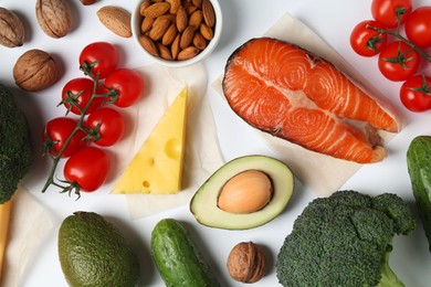 Photo of Different products on white background, flat lay. Keto diet