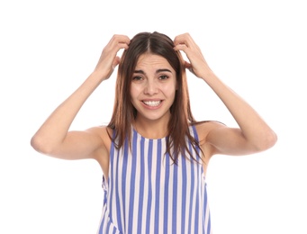 Photo of Young woman scratching head on white background. Annoying itch