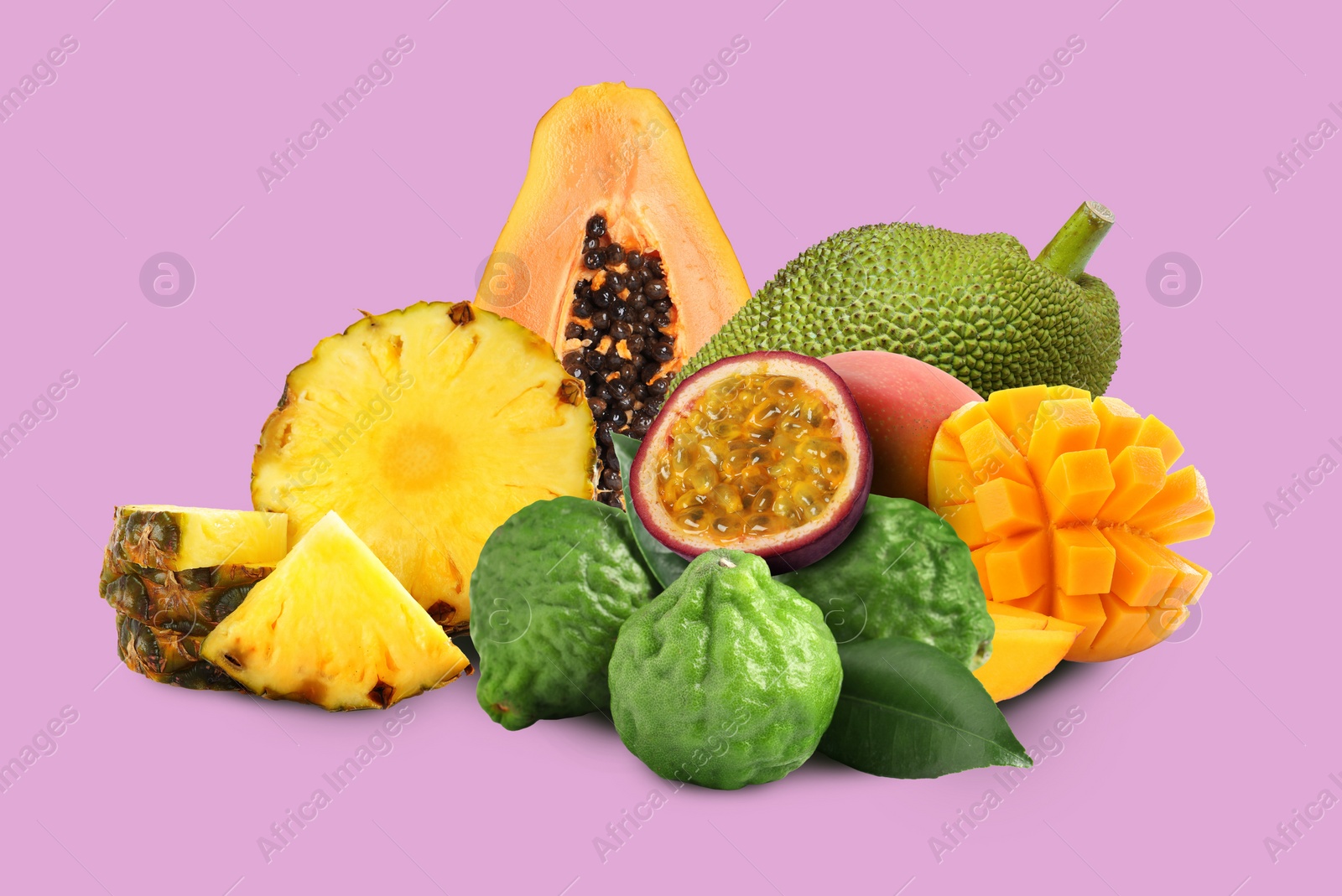 Image of Many different fresh fruits on violet background