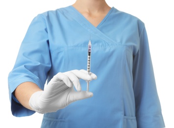 Photo of Female doctor with syringe on white background, closeup. Medical object