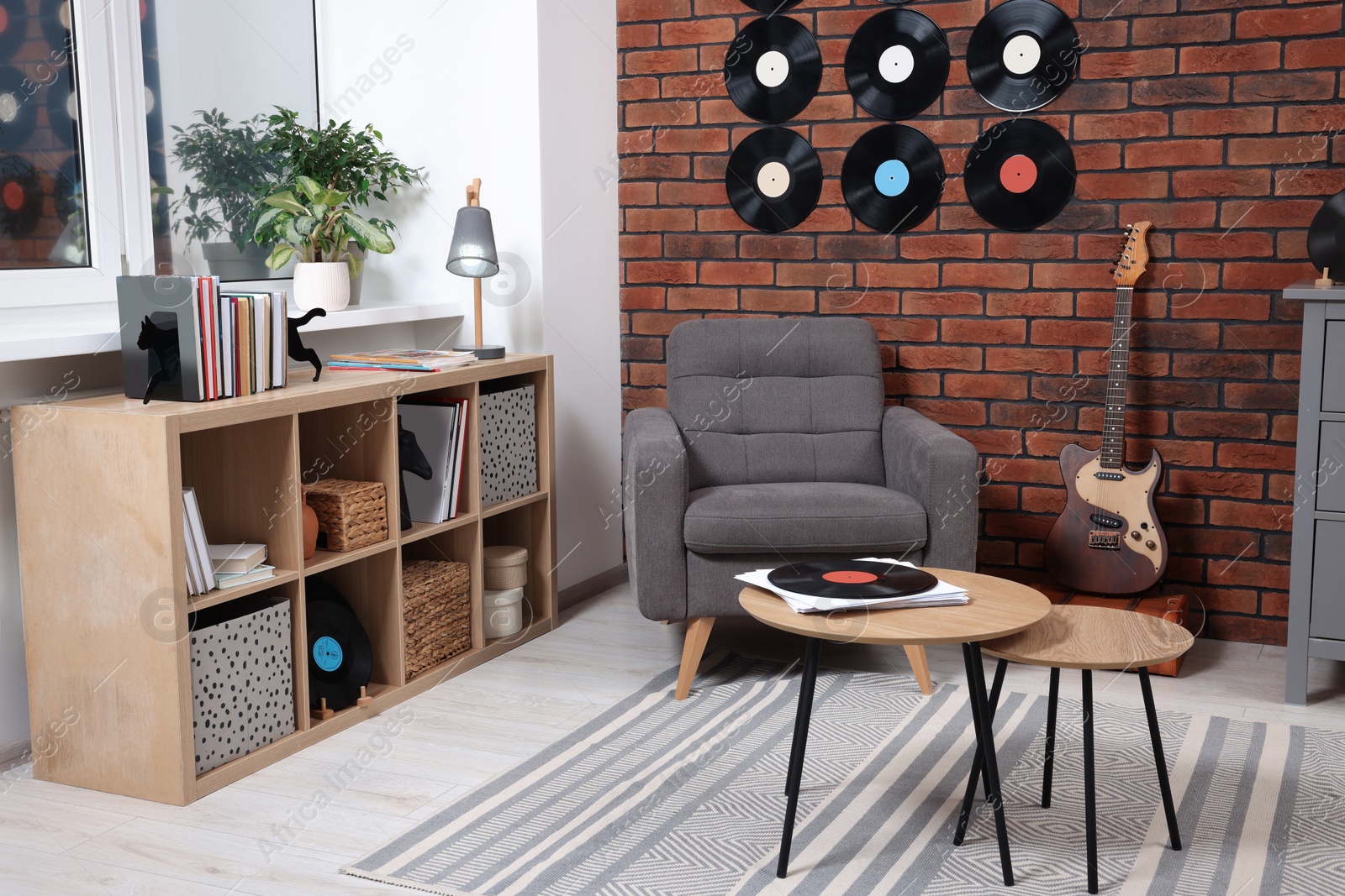 Photo of Living room decorated with vinyl records. Interior design