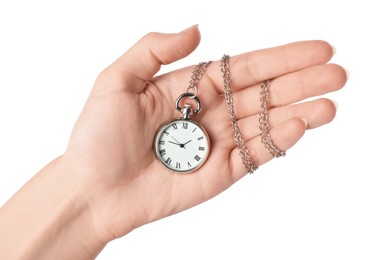 Woman holding pocket clock with chain on white background, closeup