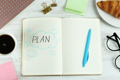 Photo of Flat lay composition of notebook with word Plan on white wooden table