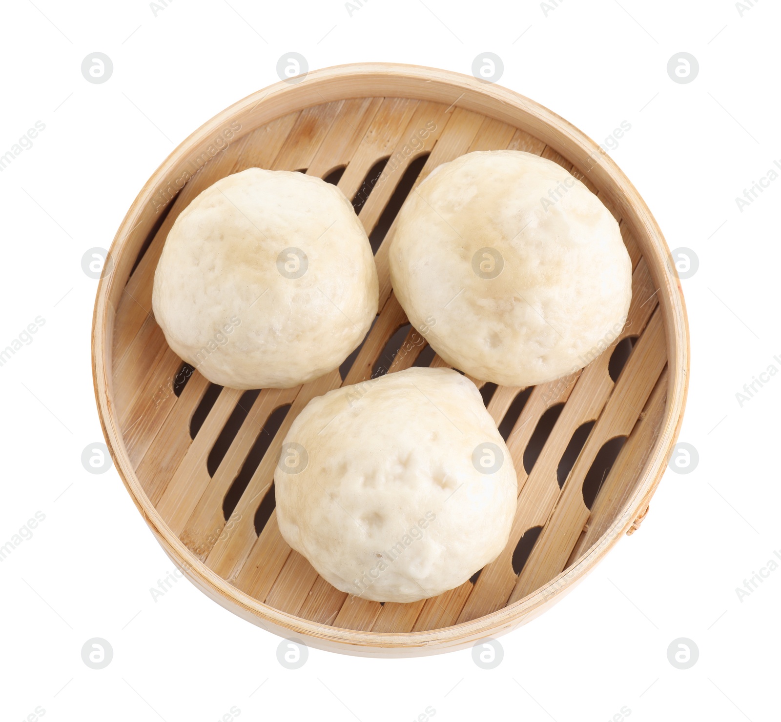 Photo of Delicious chinese steamed buns in bamboo steamer isolated on white, top view