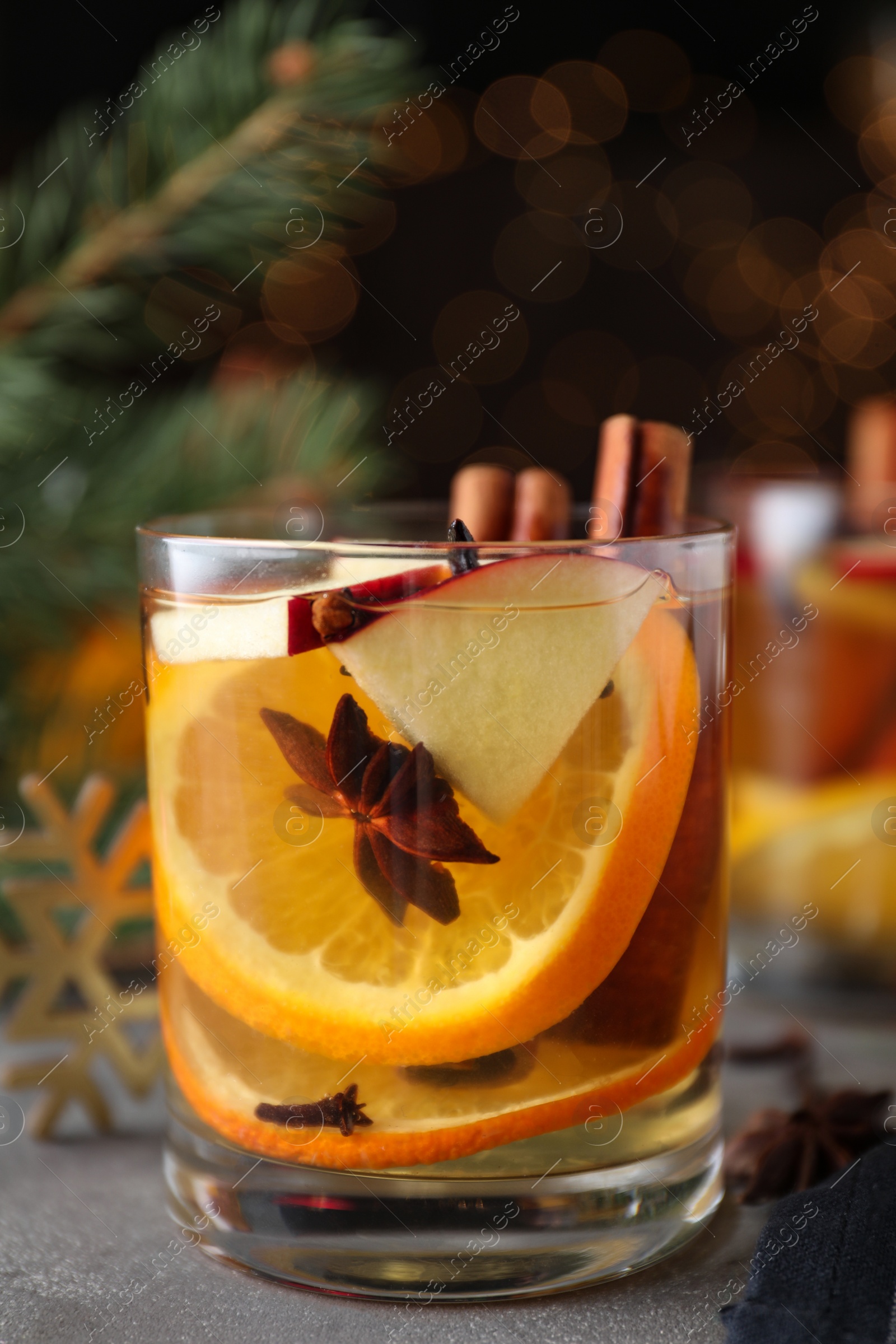 Photo of Aromatic white mulled wine on light grey table