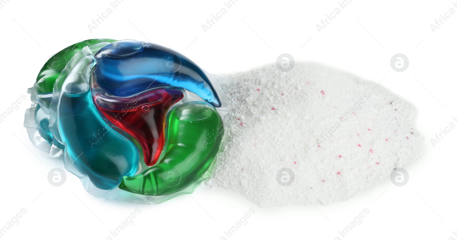 Photo of Color laundry capsules and detergent powder on white background