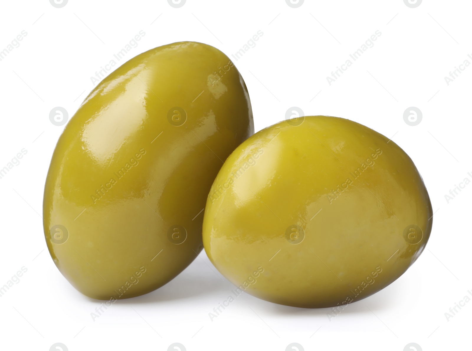 Photo of Two fresh green olives on white background