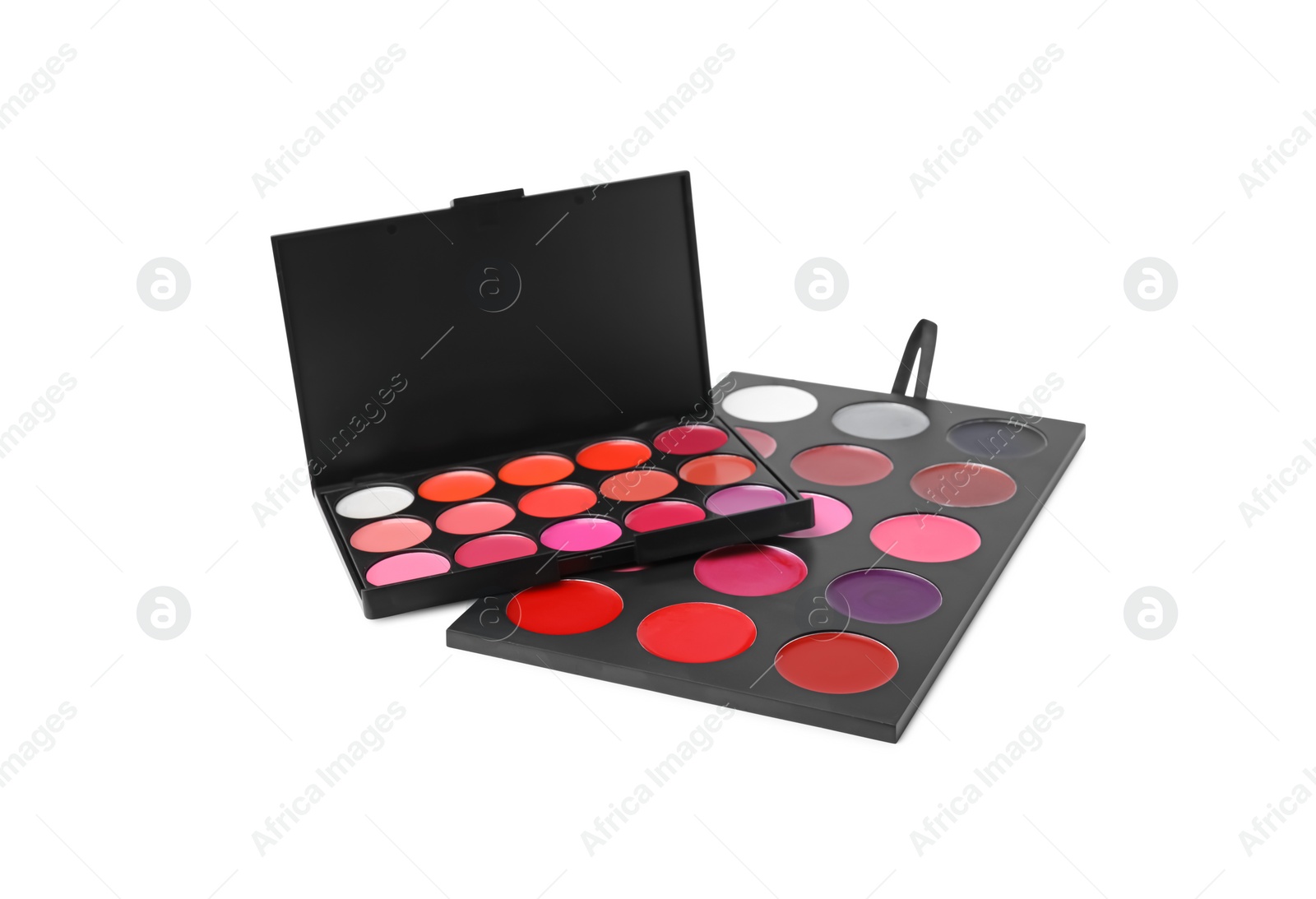 Photo of Cream lipstick palettes on white background. Professional cosmetic product