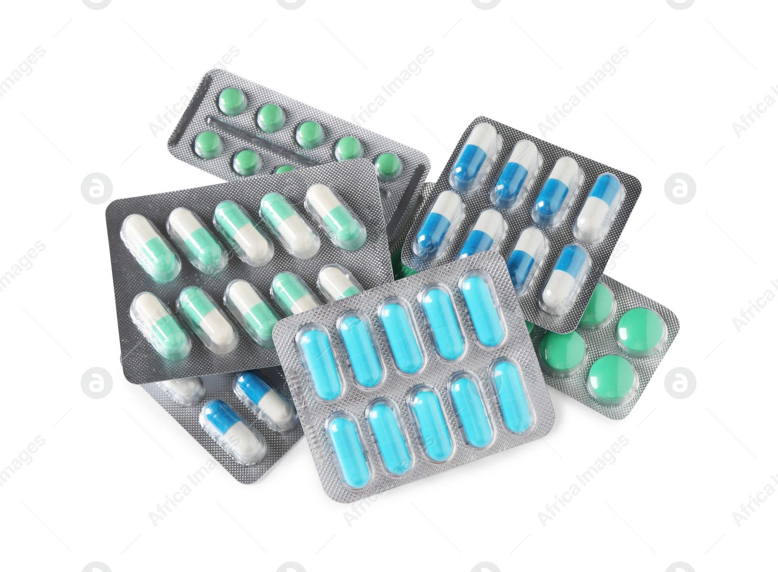 Photo of Blisters with different pills on white background, top view