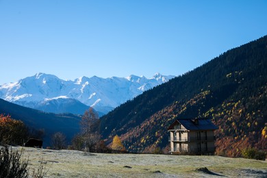 Photo of Picturesque view of beautiful high mountains under blue sky on sunny day