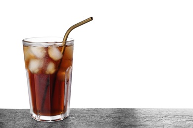 Photo of Tasty cola with ice cubes and straw on grey table against white background