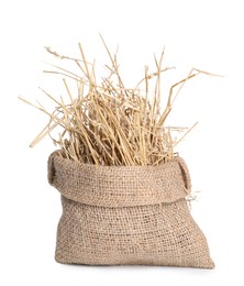 Dried straw in burlap sack isolated on white