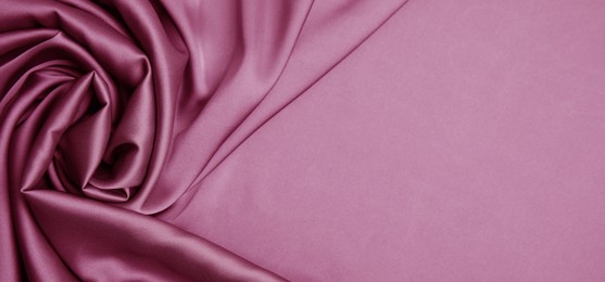 Image of Pink silk fabric as background, top view with space for text. Banner design