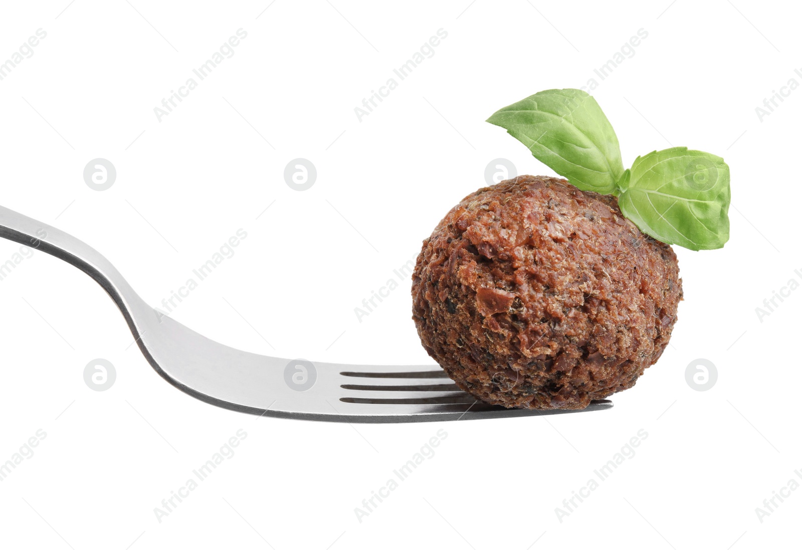 Photo of Delicious falafel ball, basil and fork isolated on white