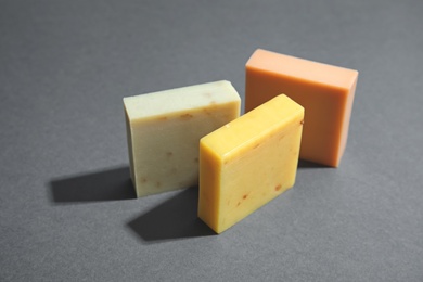 Hand made soap bars on grey background