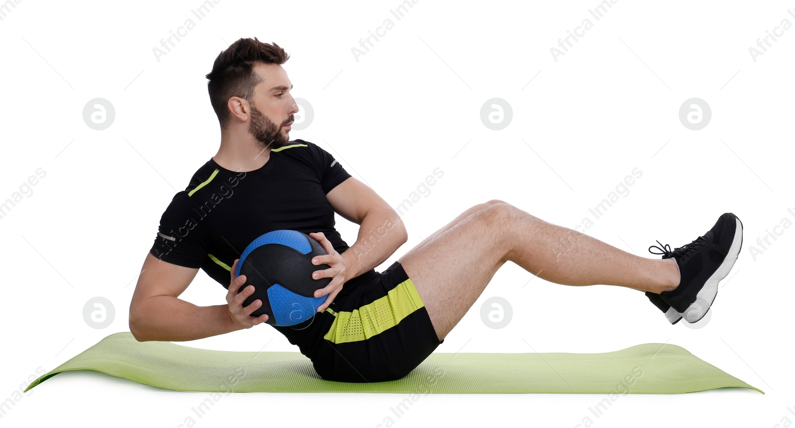 Photo of Athletic man doing exercise with medicine ball isolated on white