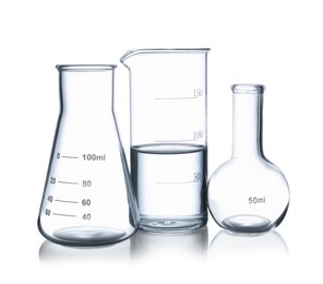 Glass flasks and beaker with water isolated on white