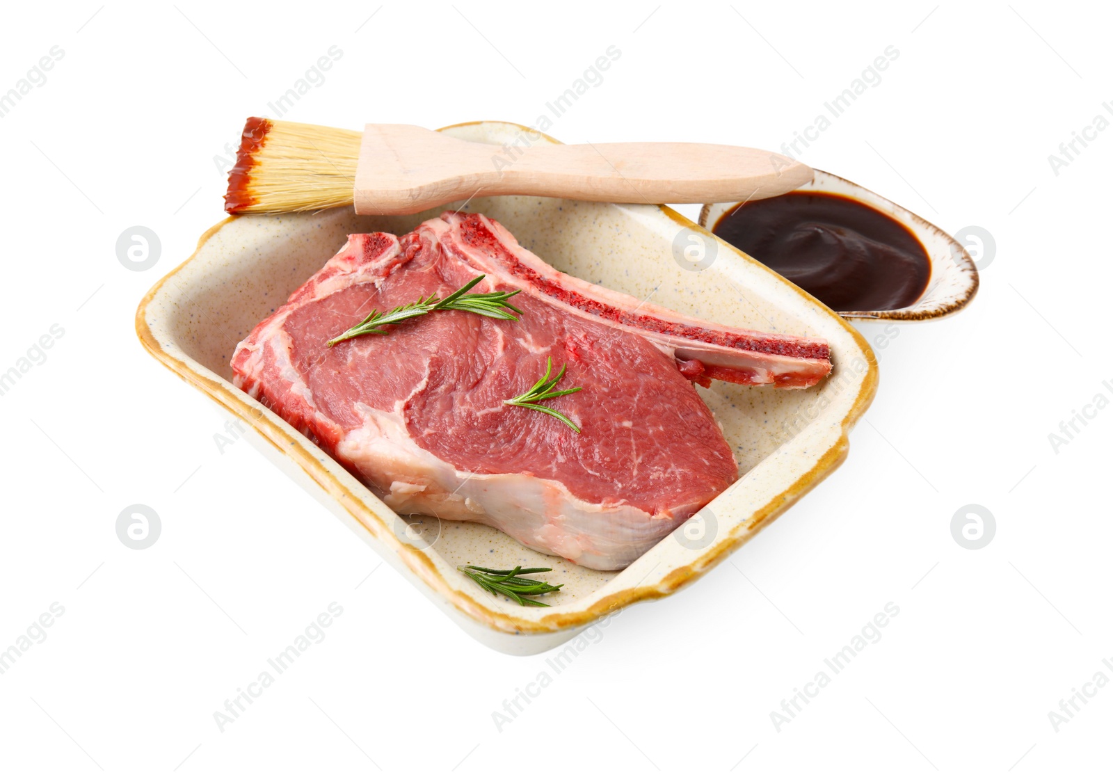 Photo of Raw meat, rosemary and brush with marinade isolated on white