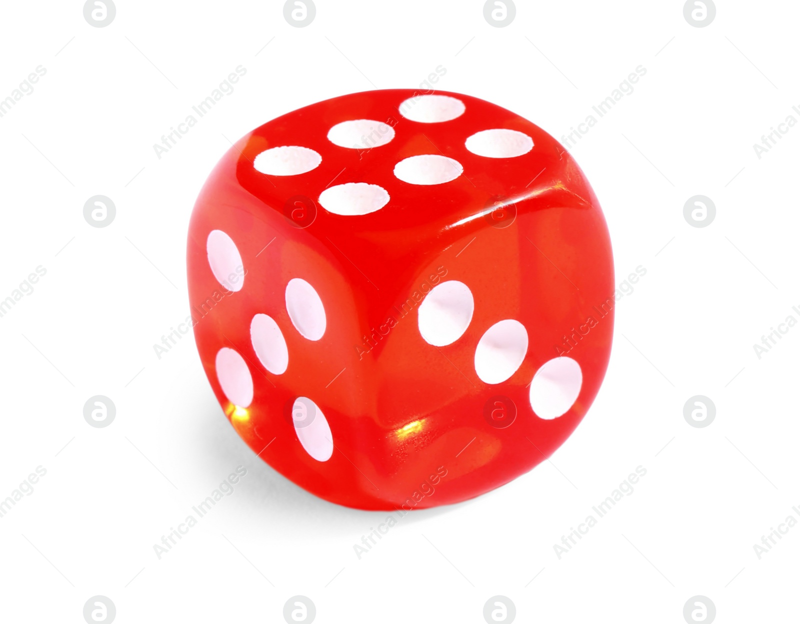 Photo of One red game dice isolated on white