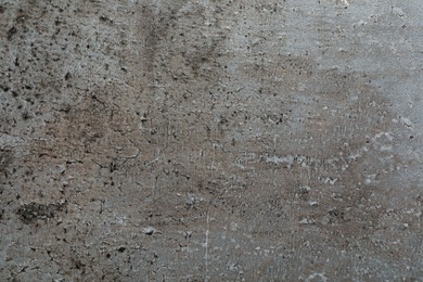 Texture of grey stone surface as background, closeup