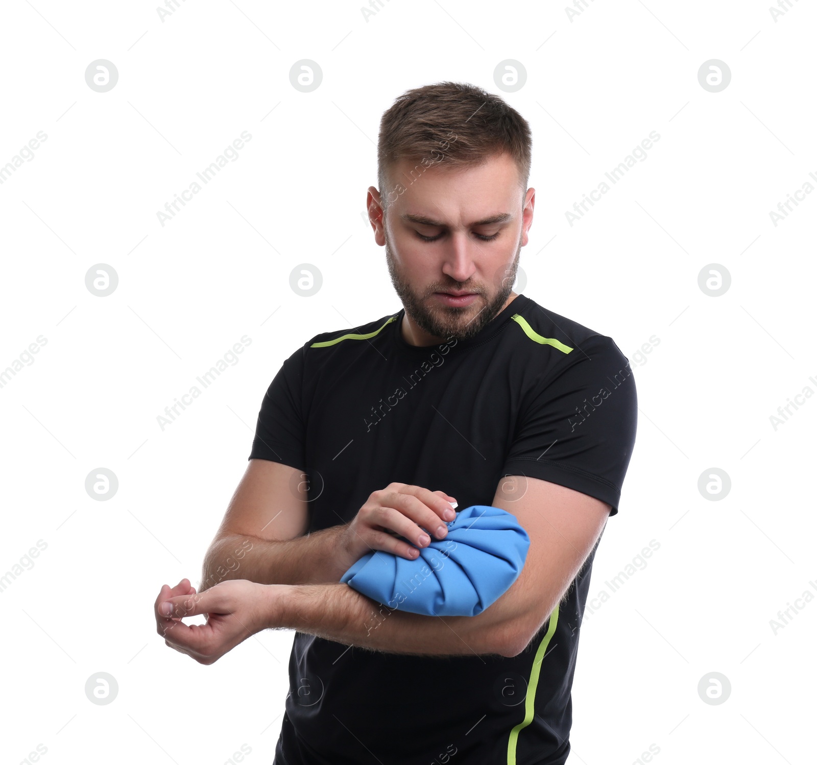 Photo of Young man with cold compress suffering from arm pain on white background