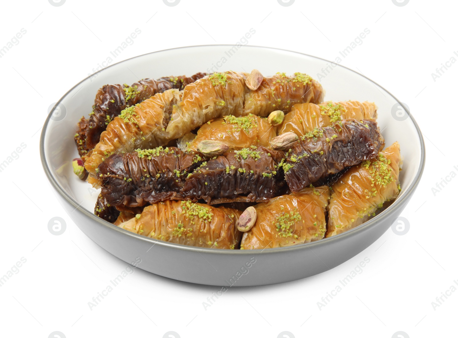 Photo of Delicious sweet baklava with pistachio nuts isolated on white