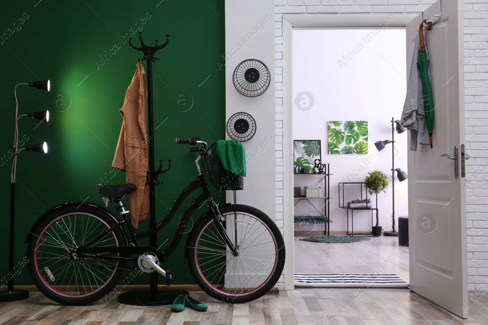 Photo of Stylish hallway with modern bicycle. Idea for interior decor