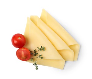 Slices of tasty fresh cheese, tomatoes and thyme isolated on white, top view