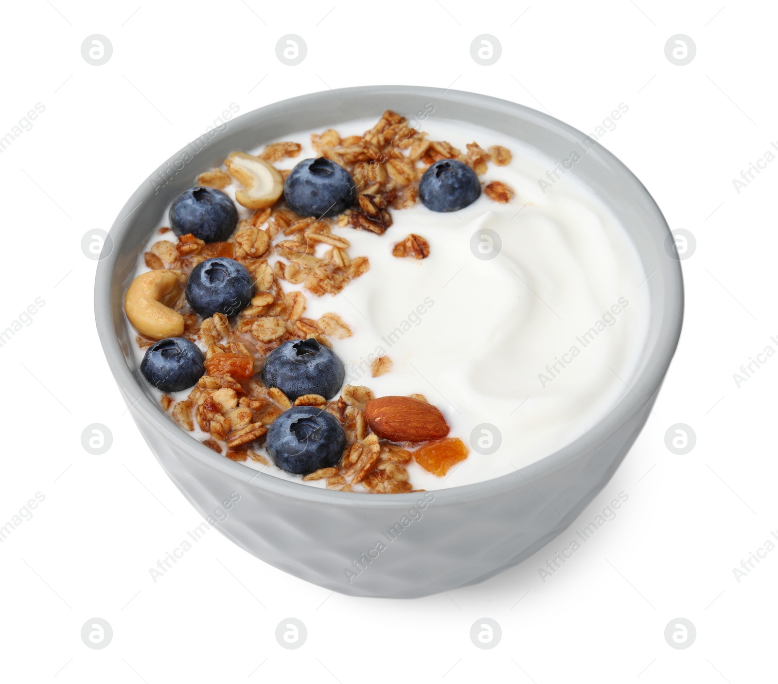 Photo of Bowl with yogurt, blueberries and granola isolated on white