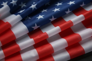 Photo of Flag of USA on black table, closeup