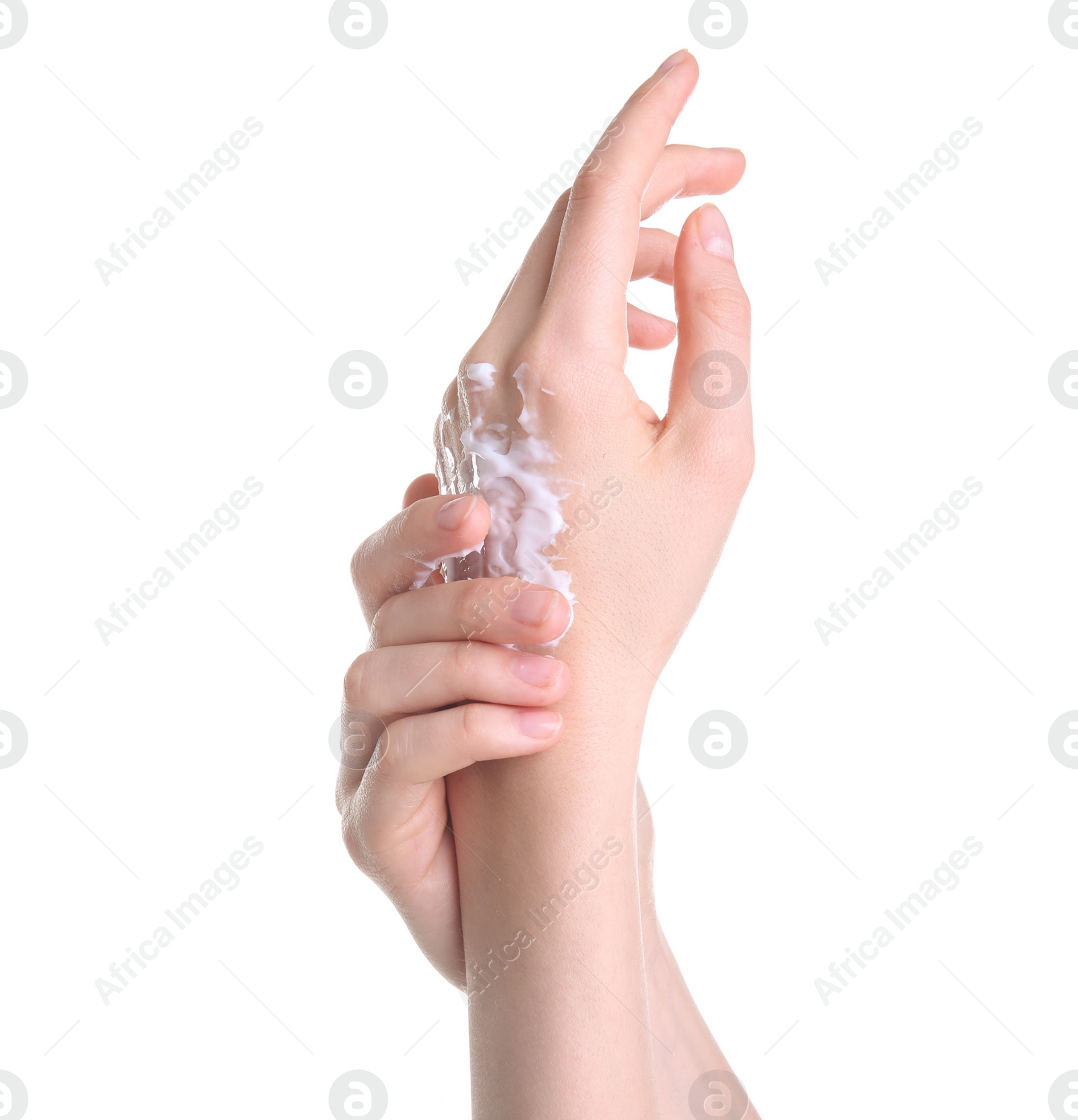 Photo of Young woman applying hand cream against on white background