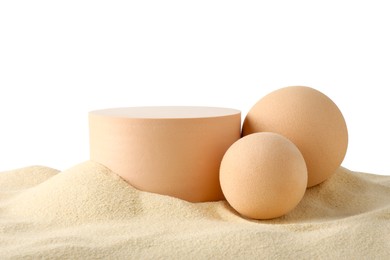 Photo of Presentation of product. Different podiums on sand against white background