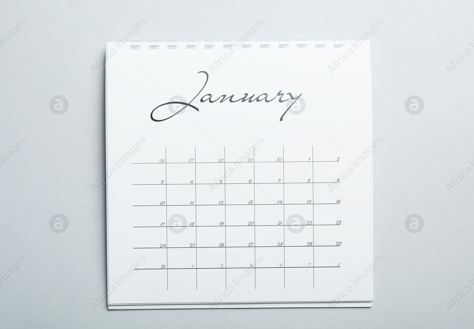 Photo of January calendar on light grey background, top view