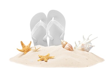 Photo of Bright flip flops in sand, starfishes and sea shells on white background