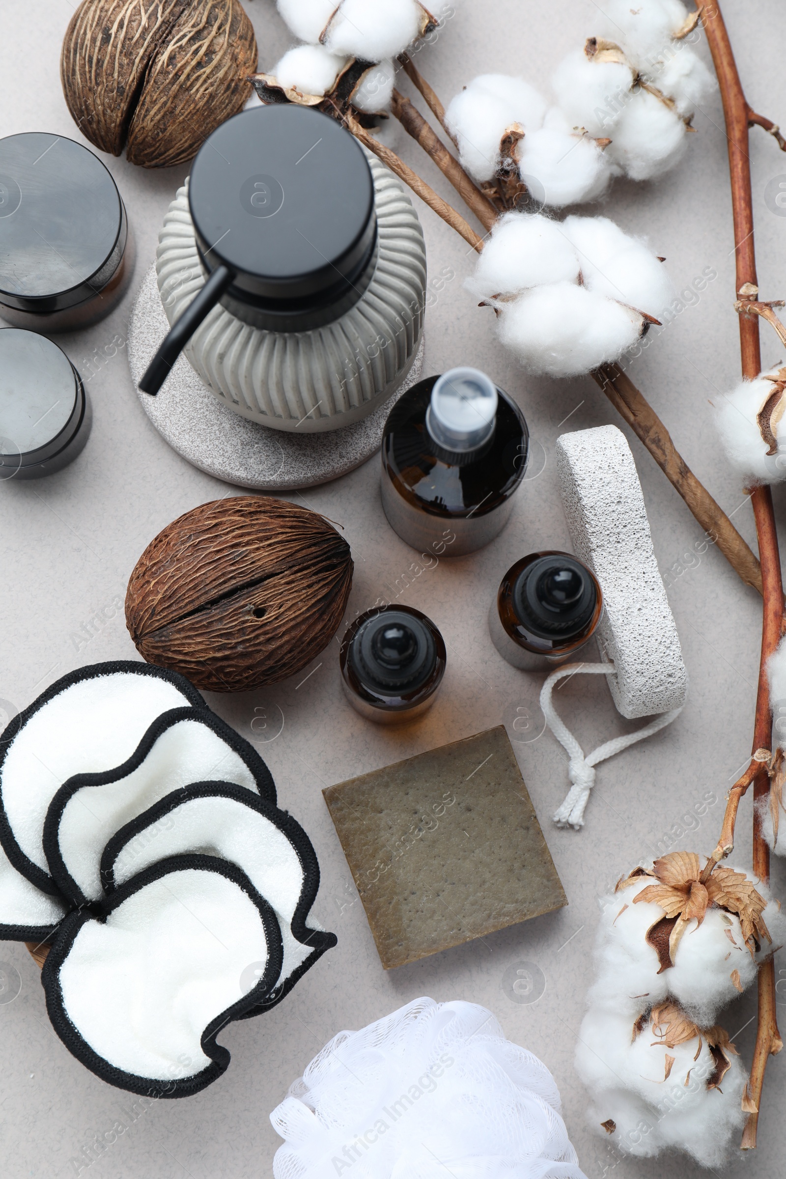 Photo of Bath accessories. Flat lay composition with personal care products on light grey background