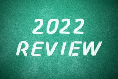 Text 2022 Review written on green chalkboard