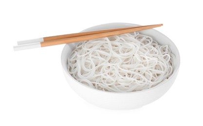Photo of Bowl with cooked rice noodles and chopsticks isolated on white