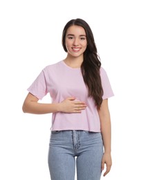 Photo of Happy healthy woman touching her belly on white background