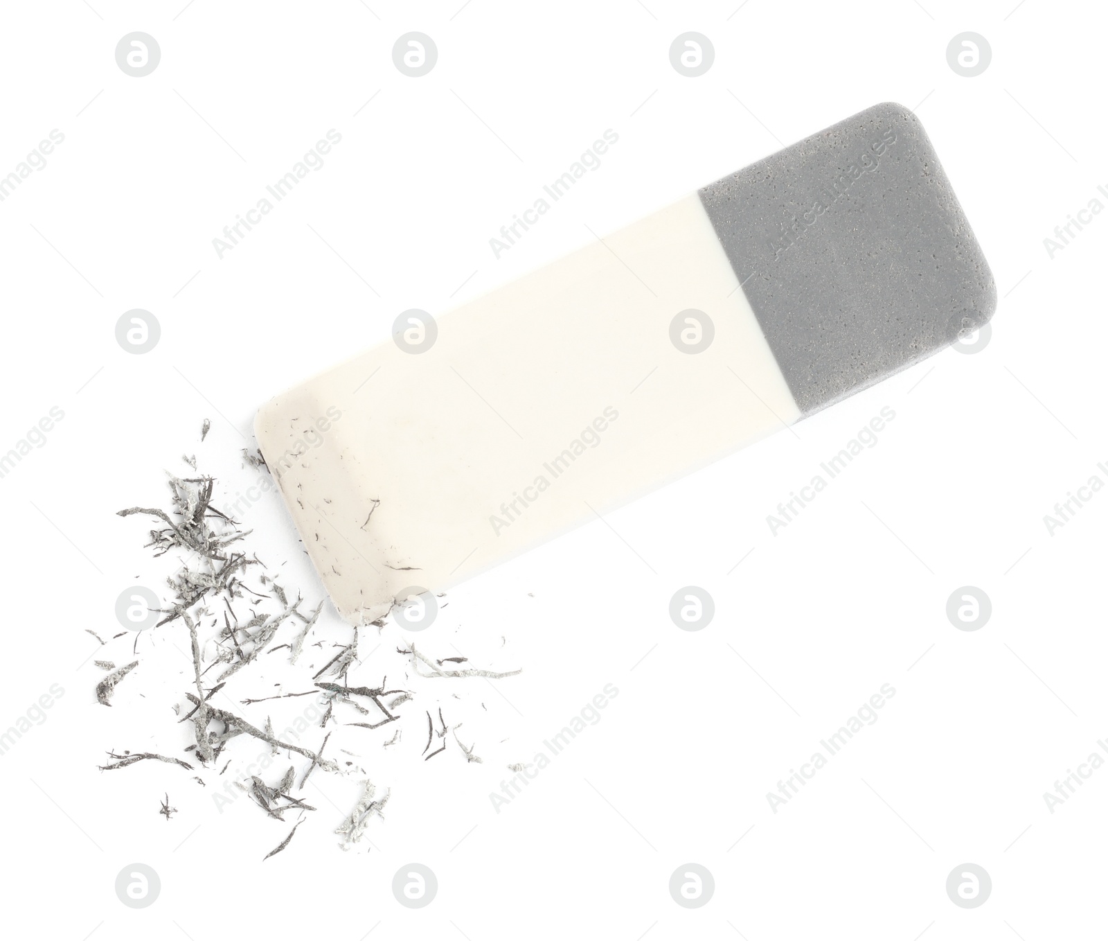 Photo of Double eraser and crumbs on white background, top view