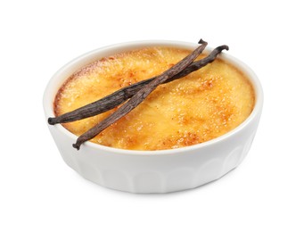 Photo of Delicious creme brulee and vanilla sticks isolated on white