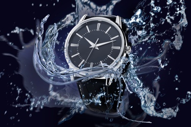 Image of Luxury men's watch in water splashes demonstrating its waterproof