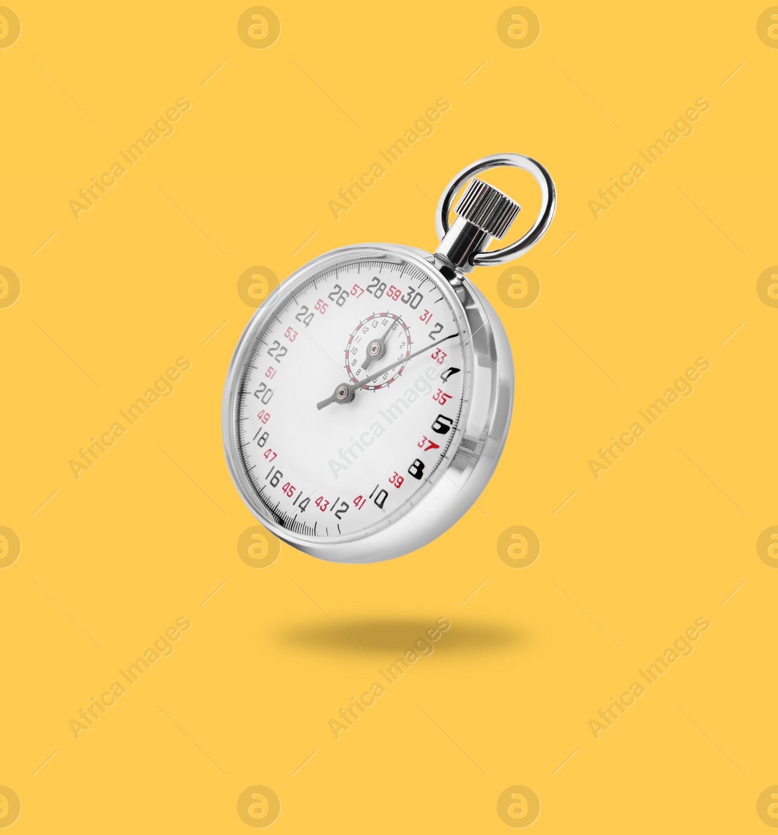 Image of Concept of time. Vintage timer in air on light orange background