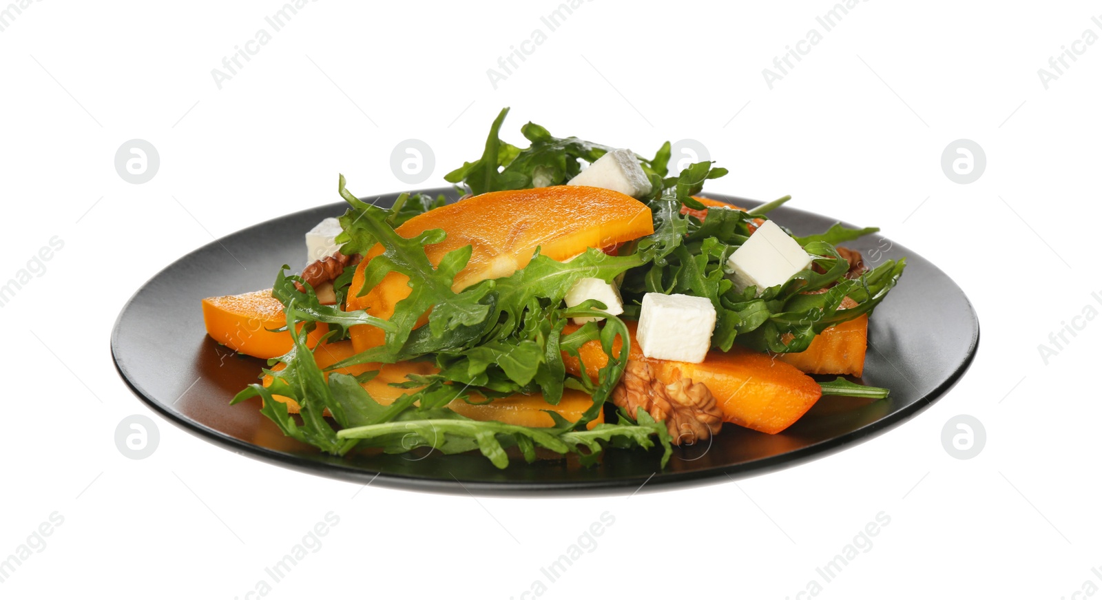 Photo of Delicious persimmon salad with feta cheese and arugula isolated on white