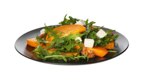 Photo of Delicious persimmon salad with feta cheese and arugula isolated on white