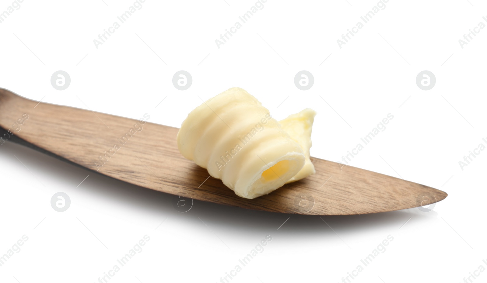 Photo of Utensil with butter curl on white background