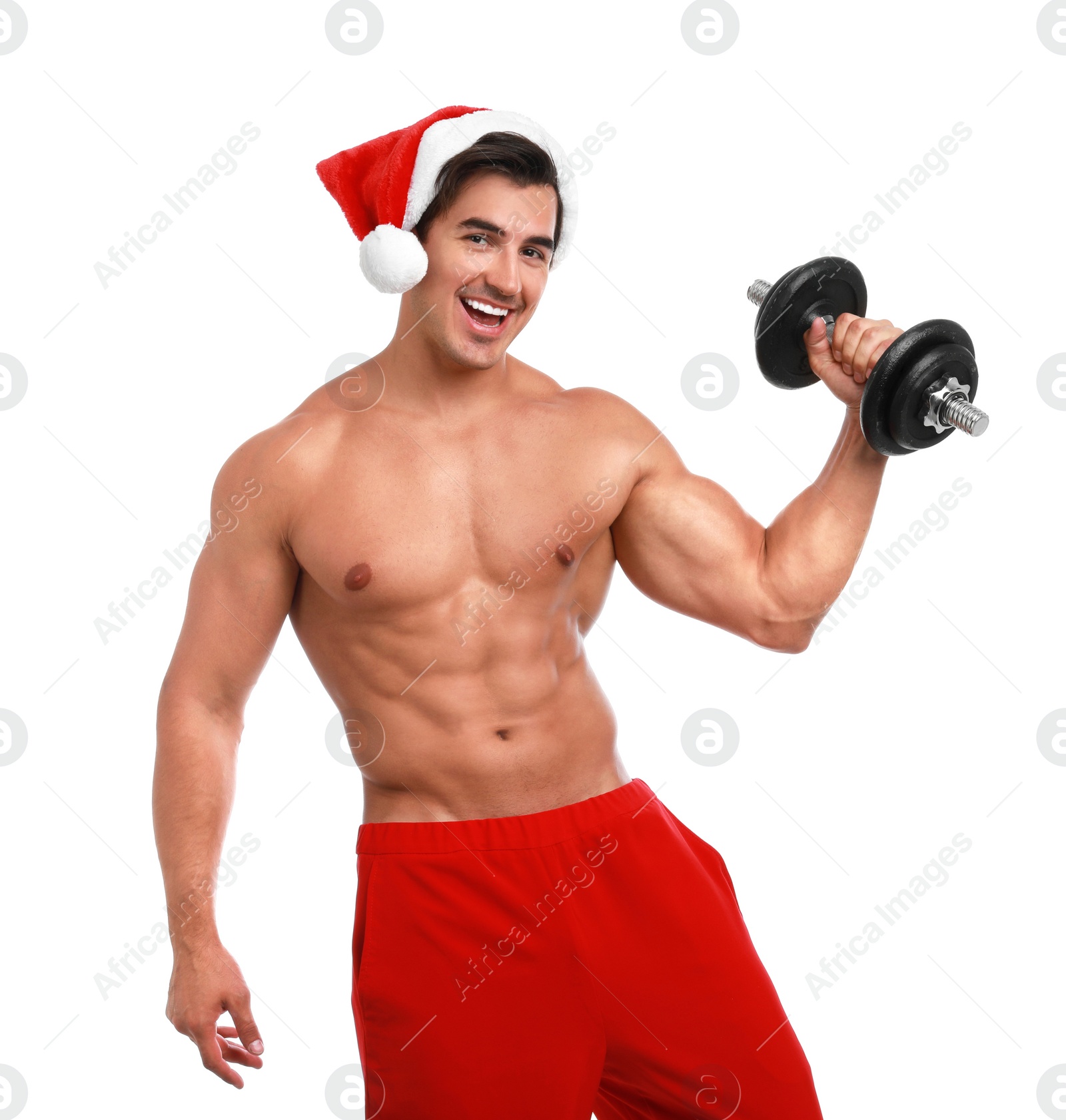Photo of Sexy shirtless Santa Claus with dumbbell on white background