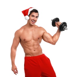 Sexy shirtless Santa Claus with dumbbell on white background